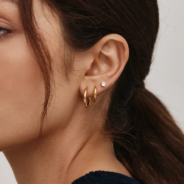Essential tennis studs flat lay — Olivia Jewelry