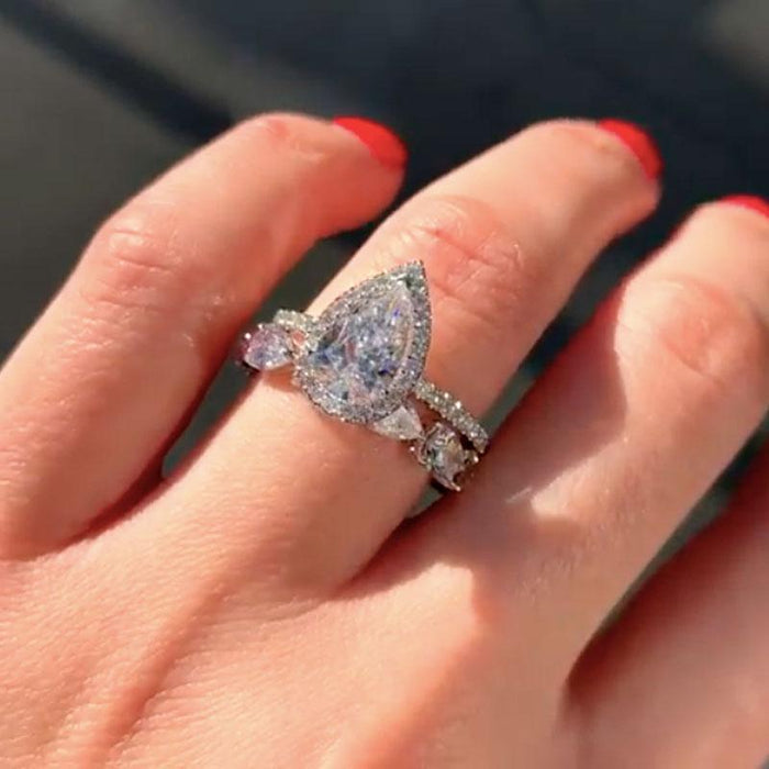 Pear Cut Engagement Ring & Heart-Shaped Wedding Band Sets