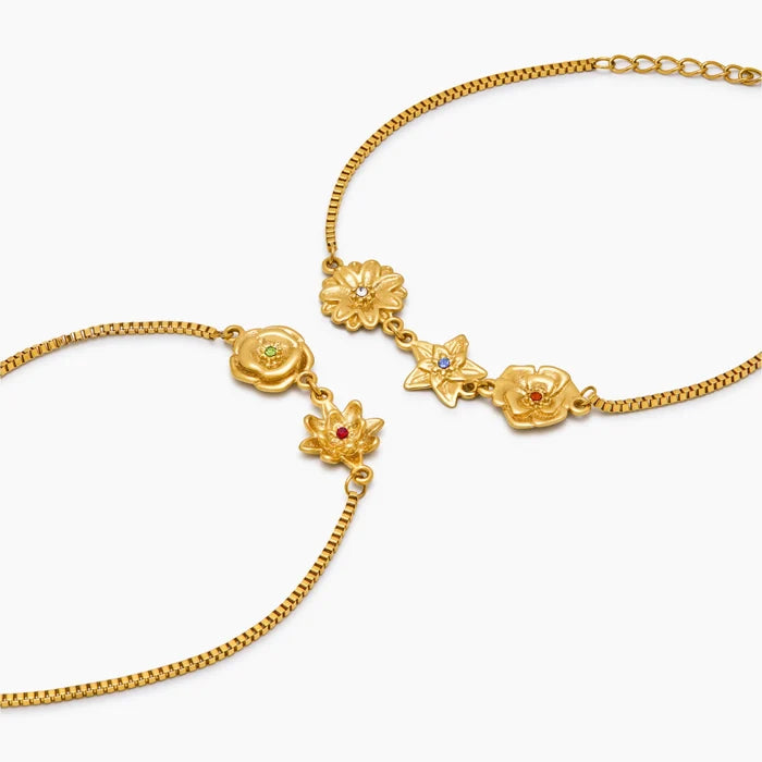Birth flower charm bracelet lifestyle shot — Olivia Jewelry