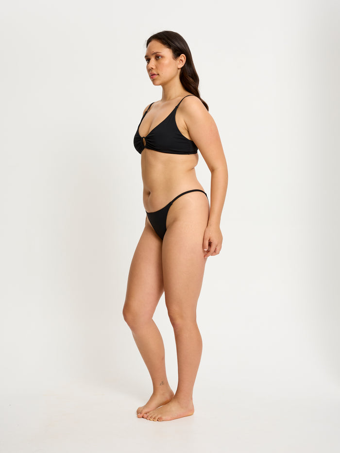 SWSCLMBLAW-1_Swimwear_String_Brief_Black_204_Model_Christiana_10-S.jpg